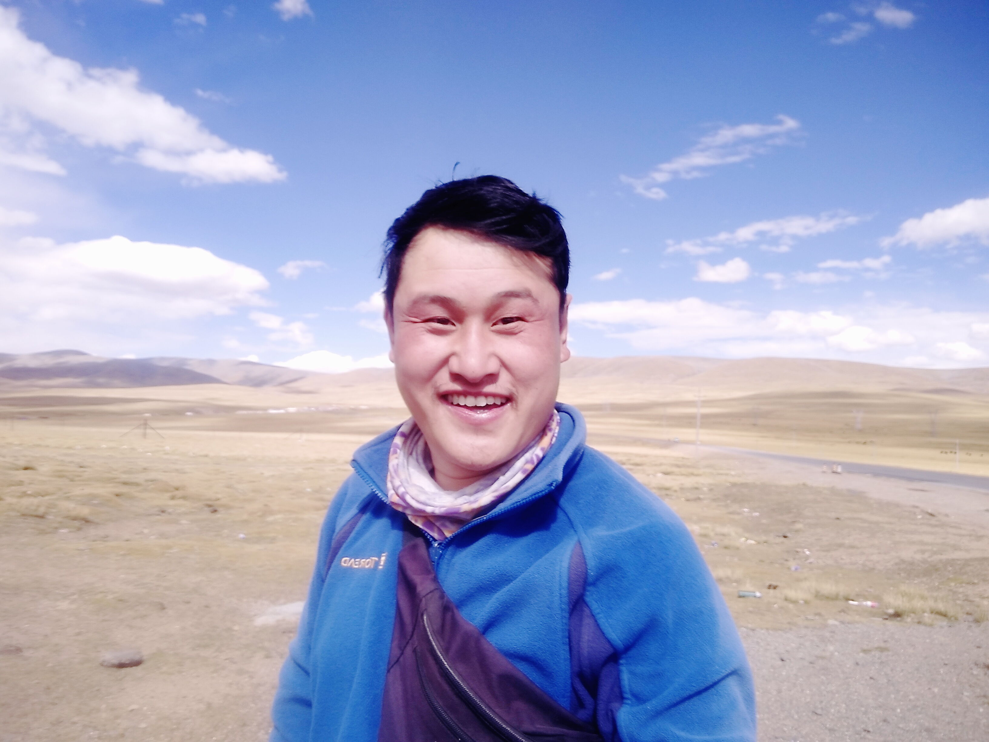 小眼睛胖子-万里骑行